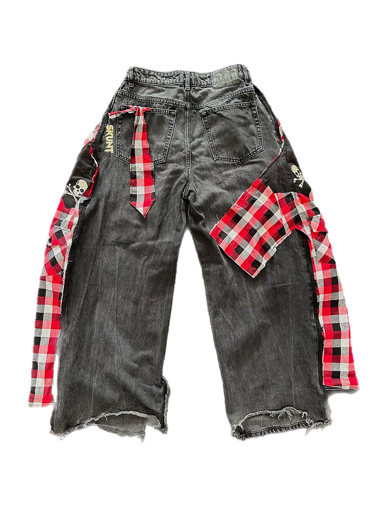 One-off reworked denim jeans with patterned insert panel